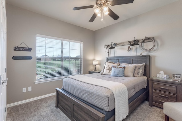 1777 Lone Star Blvd, Terrell, TX 75160 - bedroom with light carpet, baseboards, and ceiling fan