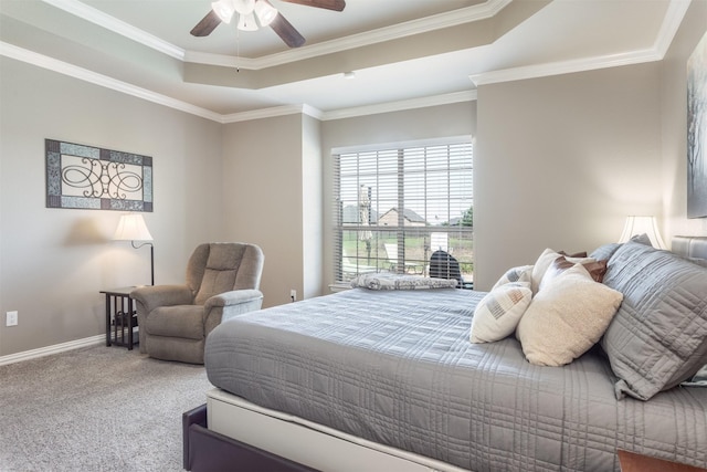 1777 Lone Star Blvd, Terrell, TX 75160 - bedroom with carpet floors, crown molding, baseboards, a raised ceiling, and ceiling fan