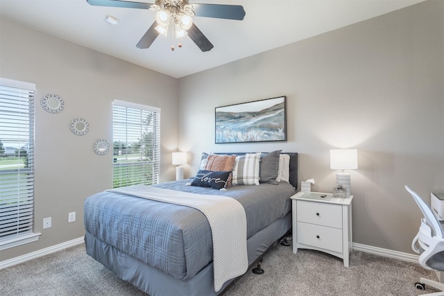 1777 Lone Star Blvd, Terrell, TX 75160 - bedroom with light colored carpet, baseboards, and a ceiling fan
