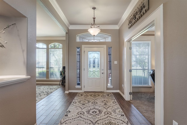 1777 Lone Star Blvd, Terrell, TX 75160 - foyer with ornamental molding, dark wood finished floors, and baseboards