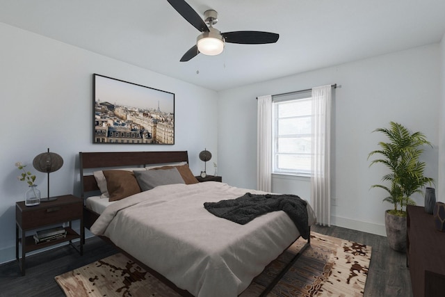 821 Collin Dr, Euless, TX 76039 - bedroom with dark wood finished floors, baseboards, and a ceiling fan