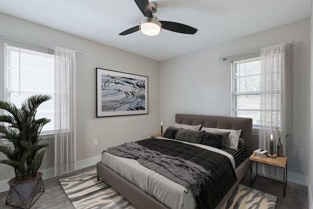 821 Collin Dr, Euless, TX 76039 - bedroom with wood finished floors, baseboards, and ceiling fan