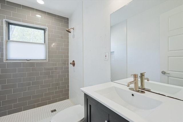821 Collin Dr, Euless, TX 76039 - full bathroom with a tile shower, toilet, and vanity