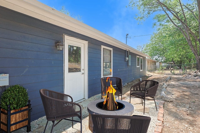 821 Collin Dr, Euless, TX 76039 - view of patio with a fire pit