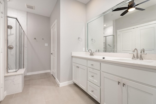 913 Emerling Dr, Mckinney, TX 75069 - full bathroom with a marble finish shower, a ceiling fan, double vanity, baseboards, and tile patterned floors