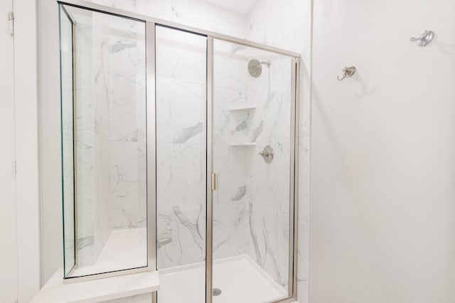 913 Emerling Dr, Mckinney, TX 75069 - bathroom with a marble finish shower