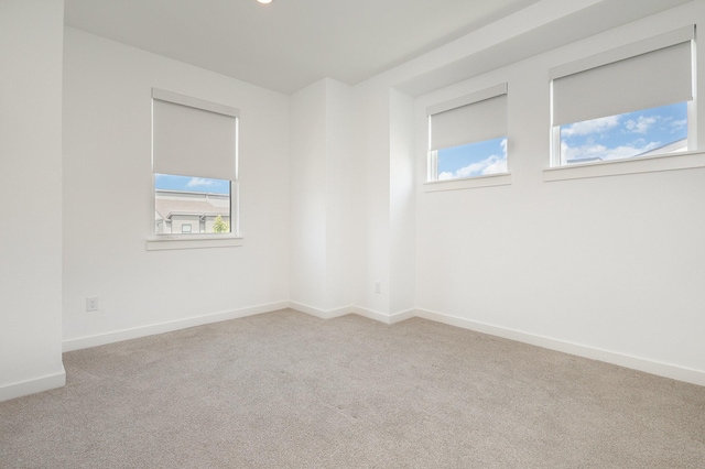 913 Emerling Dr, Mckinney, TX 75069 - unfurnished room with healthy amount of natural light, carpet flooring, and baseboards