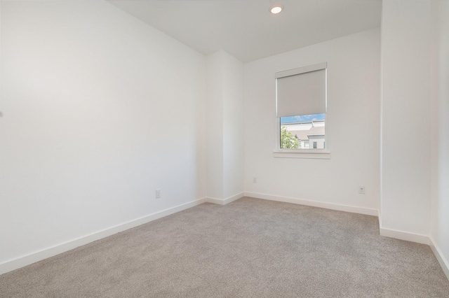 913 Emerling Dr, Mckinney, TX 75069 - spare room featuring light colored carpet, baseboards, and recessed lighting