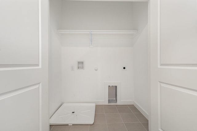 913 Emerling Dr, Mckinney, TX 75069 - laundry room featuring electric dryer hookup, hookup for a gas dryer, tile patterned floors, hookup for a washing machine, and baseboards