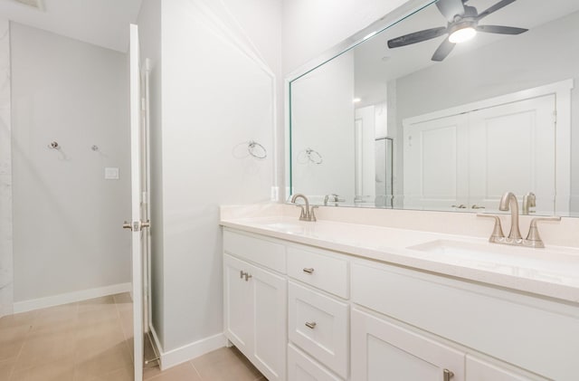 913 Emerling Dr, Mckinney, TX 75069 - full bath featuring double vanity, a ceiling fan, and baseboards