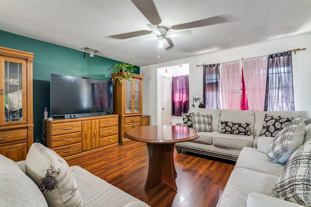 1826 Mercury Dr, Garland, TX 75040 - living area with a ceiling fan and wood finished floors