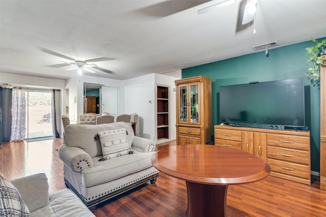 1826 Mercury Dr, Garland, TX 75040 - living room with a ceiling fan and wood finished floors