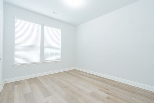 1211 Templin Ave, Forney, TX 75126 - spare room featuring light wood-style flooring and baseboards
