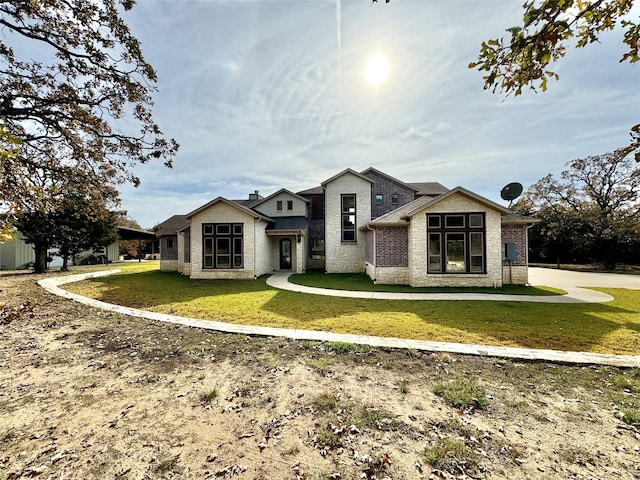 474 Eagle Cove Cir, Tioga, TX 76271 - view of front of property featuring a front lawn and brick siding
