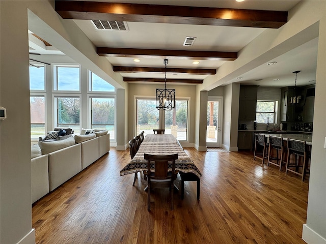 474 Eagle Cove Cir, Tioga, TX 76271 - dining room with wood finished floors, beamed ceiling, baseboards, and recessed lighting