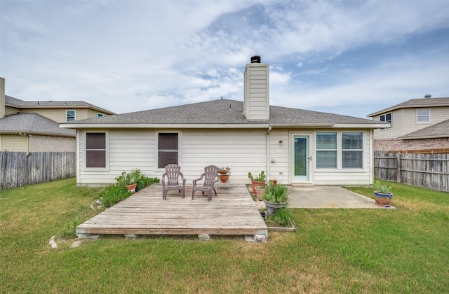 1312 Dakota Trl, Krum, TX 76249 - rear view of house featuring a wooden deck, a chimney, a shingled roof, and a patio