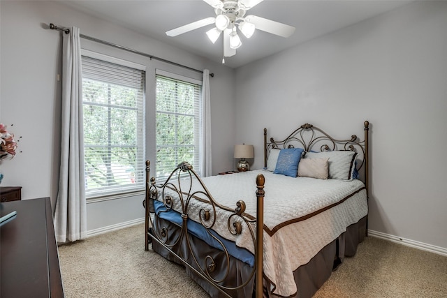 5001 Stanford Ave, Dallas, TX 75209 - bedroom with carpet, baseboards, and ceiling fan