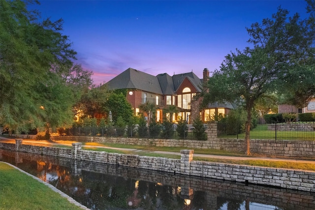 2906 Cottonwood Ln, Colleyville, TX 76034 - back of property with a water view and a chimney