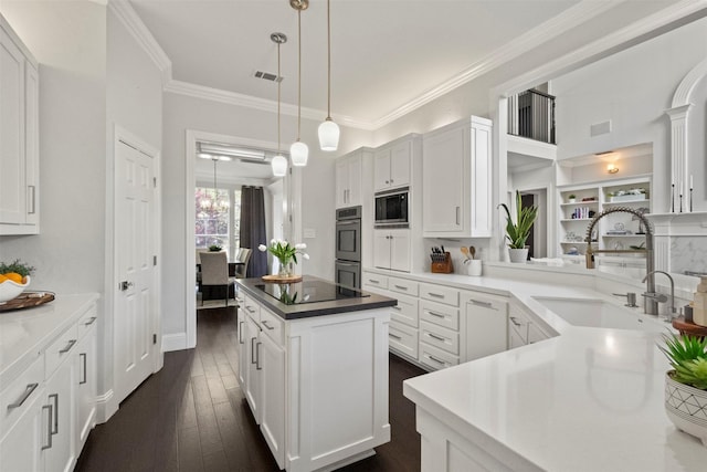 2906 Cottonwood Ln, Colleyville, TX 76034 - kitchen with a sink, black electric stovetop, built in microwave, stainless steel double oven, and white cabinetry