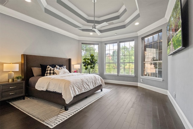 2906 Cottonwood Ln, Colleyville, TX 76034 - bedroom featuring baseboards, dark wood-style floors, a raised ceiling, ornamental molding, and a ceiling fan