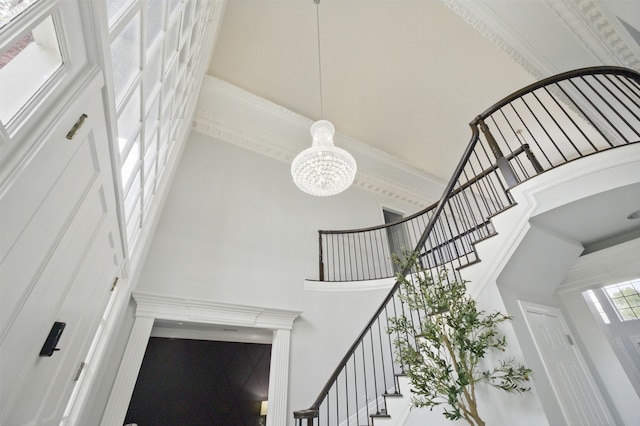 2906 Cottonwood Ln, Colleyville, TX 76034 - stairway with a towering ceiling and a chandelier