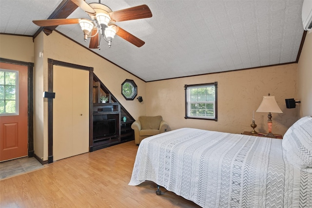 53 Bentwood Dr, Pottsboro, TX 75076 - bedroom with wood finished floors, crown molding, and a ceiling fan