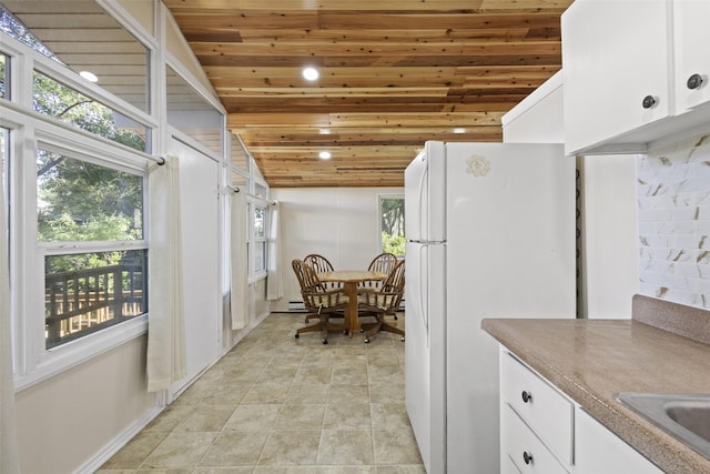 53 Bentwood Dr, Pottsboro, TX 75076 - kitchen with wood ceiling, freestanding refrigerator, white cabinetry, recessed lighting, and vaulted ceiling