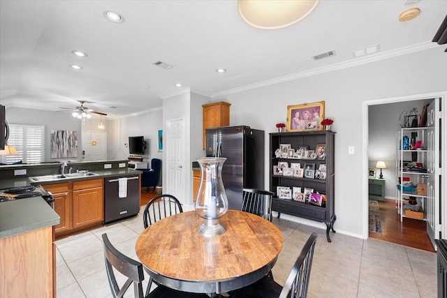 2411 Ravenwood Ct, Mansfield, TX 76063 - dining space with light tile patterned flooring, a ceiling fan, ornamental molding, recessed lighting, and baseboards