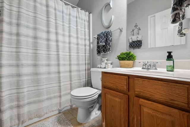 2411 Ravenwood Ct, Mansfield, TX 76063 - bathroom with toilet, vanity, tile patterned floors, and a shower with shower curtain