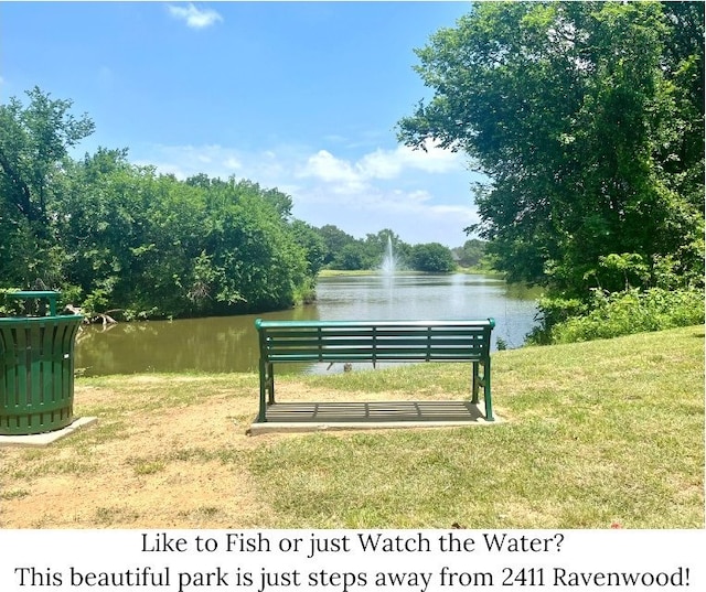 2411 Ravenwood Ct, Mansfield, TX 76063 - surrounding community with a water view and a lawn