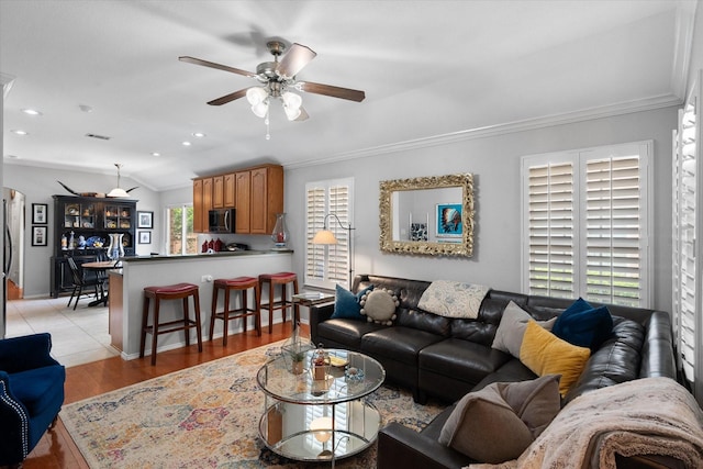 2411 Ravenwood Ct, Mansfield, TX 76063 - living area featuring ornamental molding, ceiling fan, light wood finished floors, and recessed lighting