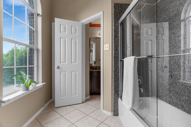 9772 Hickory St, Frisco, TX 75035 - full bath featuring healthy amount of natural light, tile patterned flooring, and baseboards
