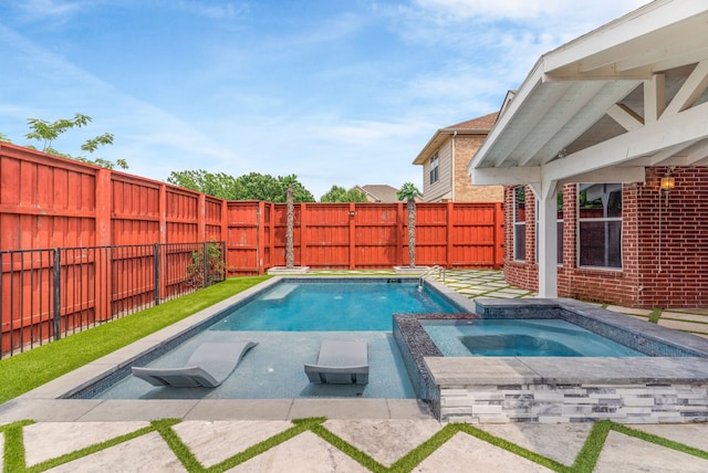 9772 Hickory St, Frisco, TX 75035 - view of swimming pool with a fenced backyard and a pool with connected hot tub