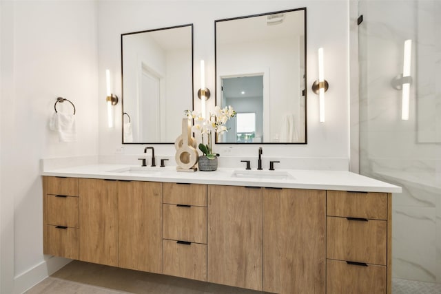 5217 Lindsley Ave, Dallas, TX 75223 - bathroom featuring double vanity and a shower
