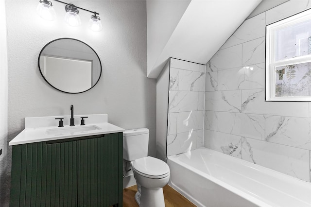 511 W Munson St, Denison, TX 75020 - full bathroom with vanity, toilet, wood finished floors, and a textured wall