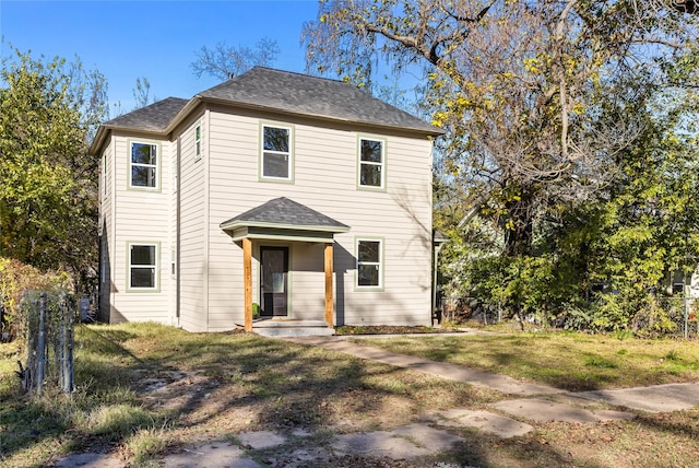 511 W Munson St, Denison, TX 75020 - view of front of home featuring a shingled roof