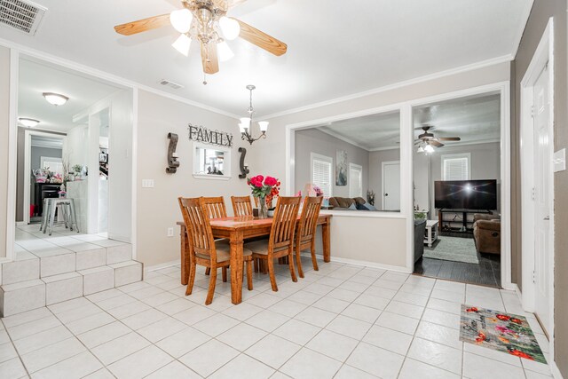 350 Vz County Road 3907, Wills Point, TX 75169 - dining area with ceiling fan, light tile patterned floors, crown molding, and baseboards