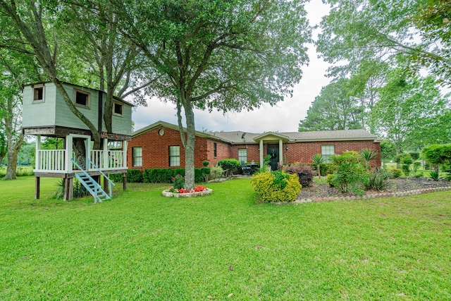 350 Vz County Road 3907, Wills Point, TX 75169 - rear view of house with a yard, brick siding, and stairs