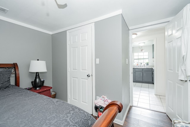 350 Vz County Road 3907, Wills Point, TX 75169 - bedroom with wood finished floors, ceiling fan, and a sink