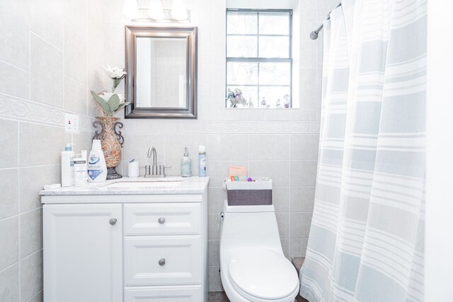 350 Vz County Road 3907, Wills Point, TX 75169 - full bathroom with tile walls, toilet, vanity, and curtained shower