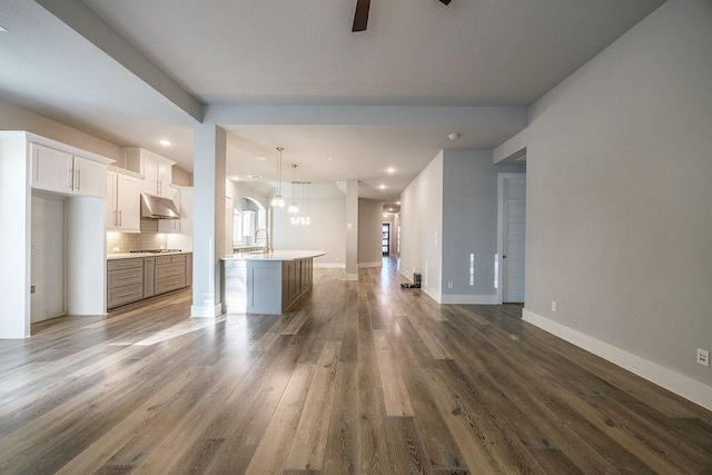 13805 Marys Ridge Rd, Fort Worth, TX 76008 - unfurnished living room with wood finished floors, a ceiling fan, recessed lighting, baseboards, and a sink