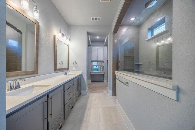 13805 Marys Ridge Rd, Fort Worth, TX 76008 - bathroom featuring double vanity, walk in shower, baseboards, and tile patterned flooring