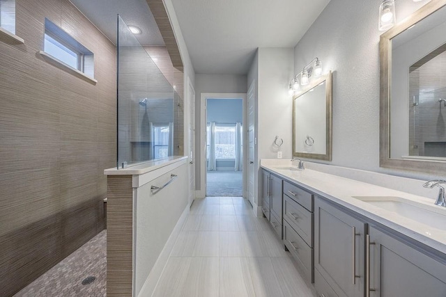 13805 Marys Ridge Rd, Fort Worth, TX 76008 - bathroom featuring walk in shower, double vanity, tile patterned floors, and baseboards
