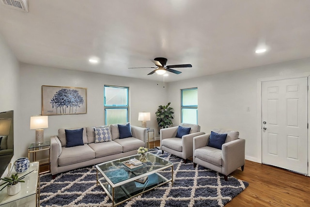 3920 Vanette Ln, Dallas, TX 75216 - living room with a ceiling fan, wood finished floors, plenty of natural light, recessed lighting, and baseboards
