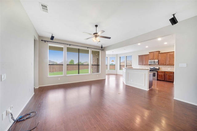 5125 Sugarberry Dr, Mckinney, TX 75071 - unfurnished living room with dark wood finished floors, a ceiling fan, baseboards, and recessed lighting