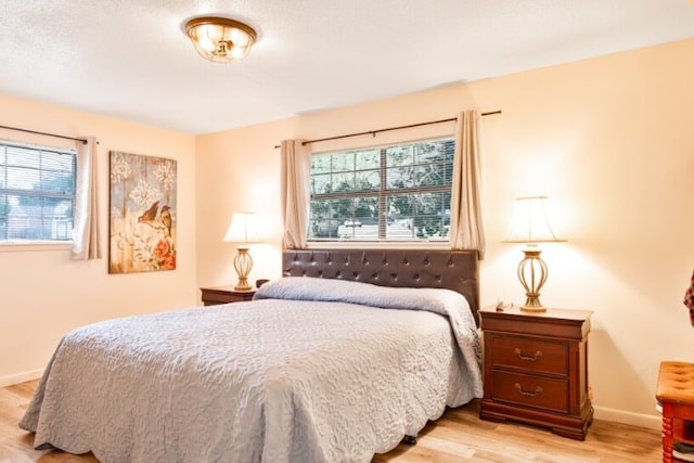 324 Peachtree St, Fairfield, TX 75840 - bedroom featuring light wood-type flooring and baseboards