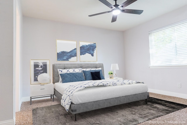 2123 Wheaton Dr, Richardson, TX 75081 - bedroom with baseboards, carpet floors, and a ceiling fan