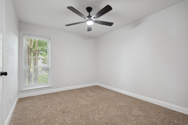 2123 Wheaton Dr, Richardson, TX 75081 - carpeted empty room featuring baseboards and ceiling fan