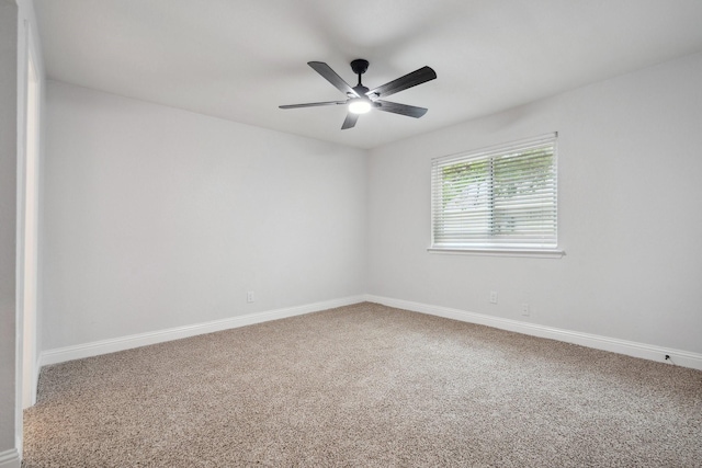 2123 Wheaton Dr, Richardson, TX 75081 - carpeted empty room featuring a ceiling fan and baseboards