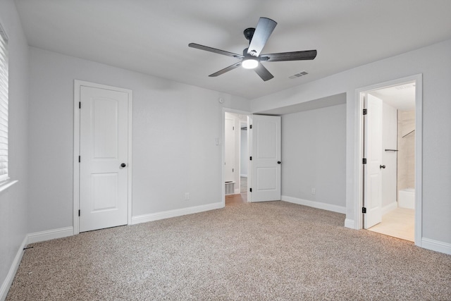 2123 Wheaton Dr, Richardson, TX 75081 - unfurnished bedroom featuring carpet floors, baseboards, ensuite bathroom, and a ceiling fan